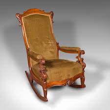 antique upholstered rocking chair