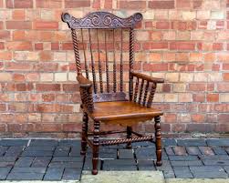 antique pressed back rocking chair