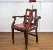 antique wooden barber chair